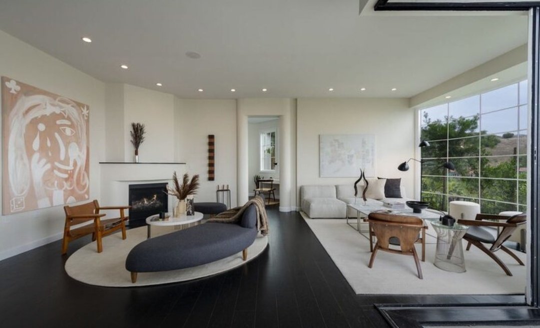 LOUIS WOULD SIT HERE AND RELAX BY THE FIREPLACE