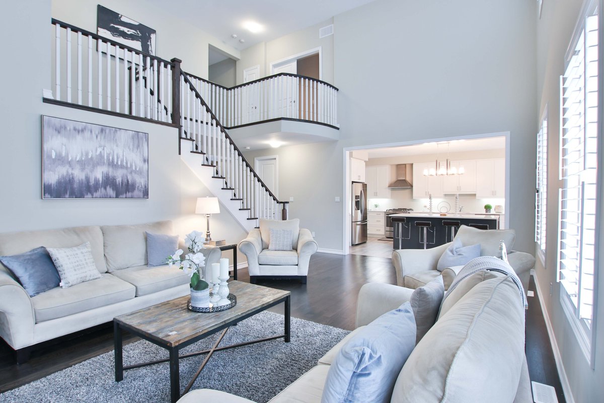 KosaaDesign's tweet photo. The clean #monochrome lines of the staircase perfectly compliment the #modern #livingroom space. https://t.co/pKLxZv3SjI #interiordecorating #interiordesignercanada #homedecor #vancouverdesigner #torontodesigners #calgarydesign #interiorinspo #dreamhome #drapes #curtains https://t.co/ogMnuHWIdU