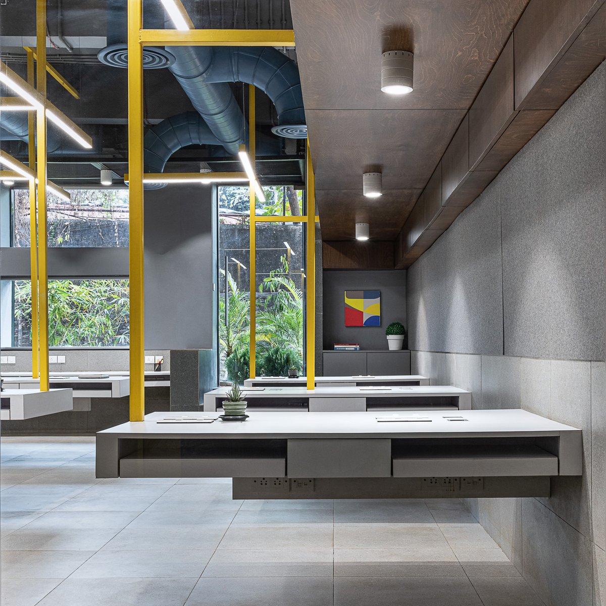 ArchitectsDig's tweet photo. Linear LED lights integrated into the arms connecting the workstations to the ceiling, a floating yellow staircase and graphically-arranged exposed services make the visual narrative of the Suspended Office more interesting and complex.
#DIGDesignStudio #DIGArchitects https://t.co/fShPxjpRSq