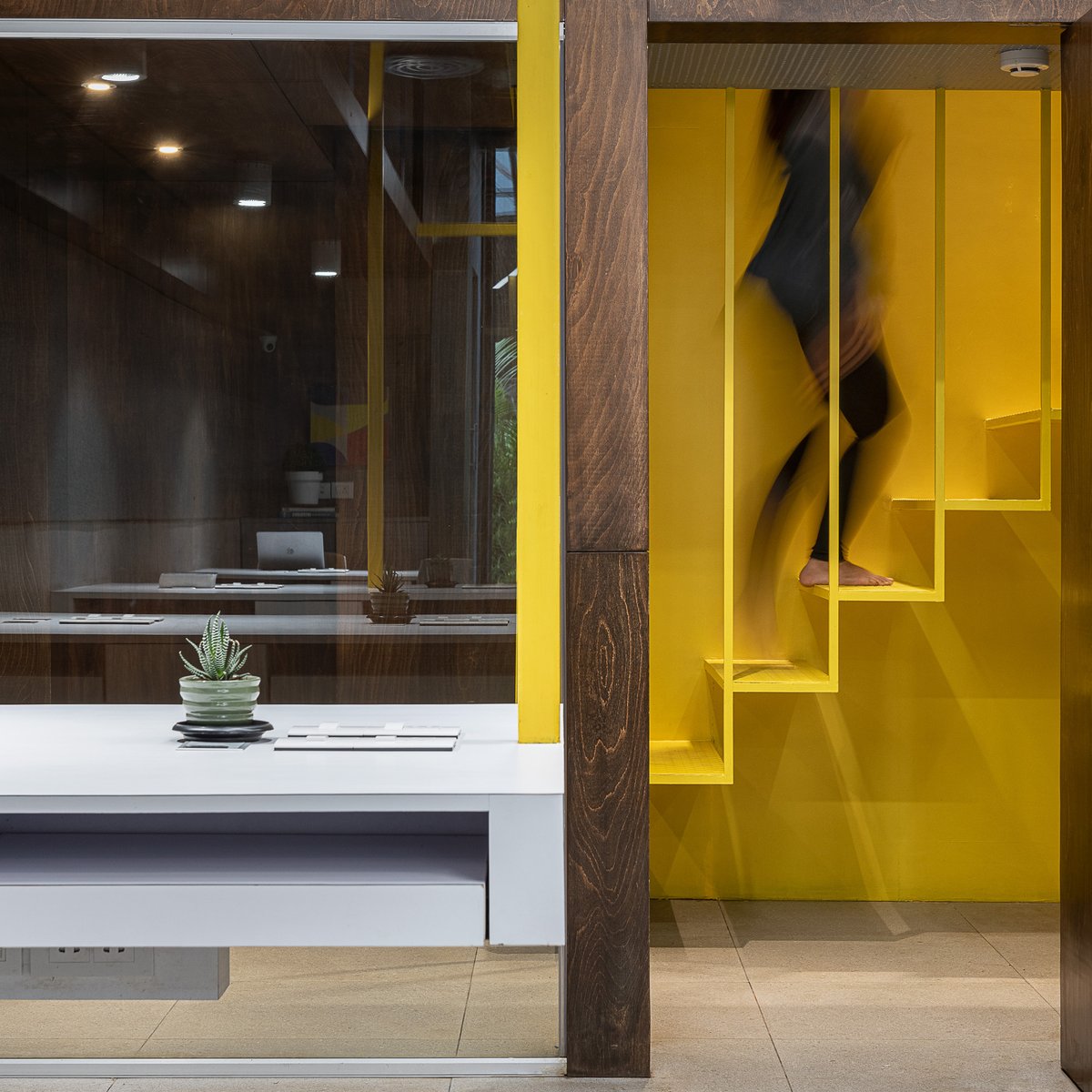 ArchitectsDig's tweet photo. Linear LED lights integrated into the arms connecting the workstations to the ceiling, a floating yellow staircase and graphically-arranged exposed services make the visual narrative of the Suspended Office more interesting and complex.
#DIGDesignStudio #DIGArchitects https://t.co/fShPxjpRSq