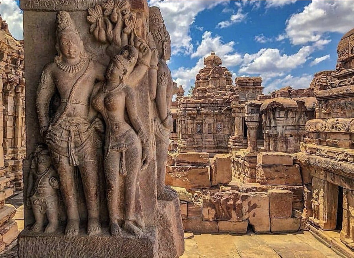 There are a number of Buddhist, Jain, Hindu cave temples (and two Ajivaka caves) in rocky hills far away from cities, all over India.Monoliths are few & far between. Structural temples, that is temples created by aligning cut blocks of rock, then sculpted & embellished, are the