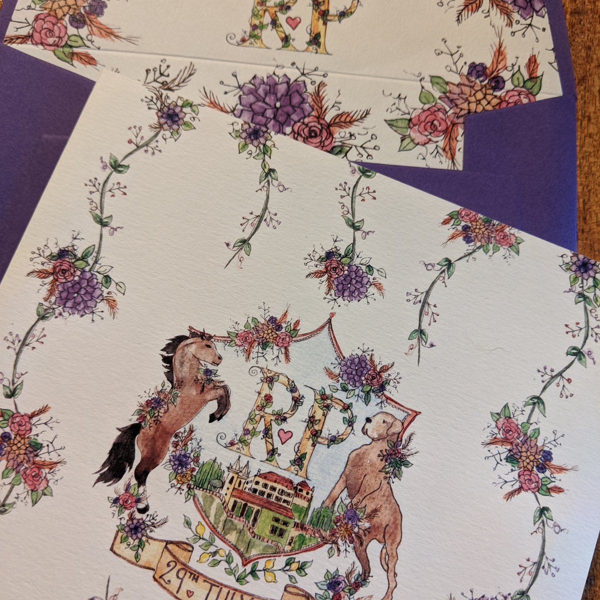 Custom crest incorporating my clients initials, wedding venue, wedding flowers and family pets...the devil is in the detail! #familycrest #illustratedstationery #illustration #watercolourillustration #watercolour #weddingflowers #coatofarms #weddinginspiration