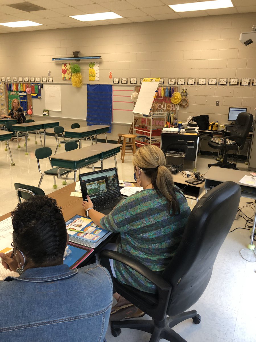 SES__Principal's tweet photo. First grade teachers @ SES teach via remote learning. https://t.co/BZK3iNeRJ3