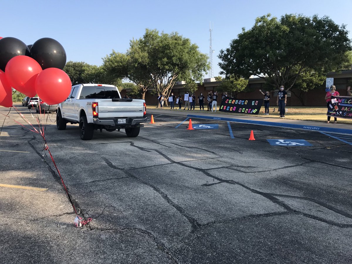 Students and parents “Drive Through” to greet their teachers!