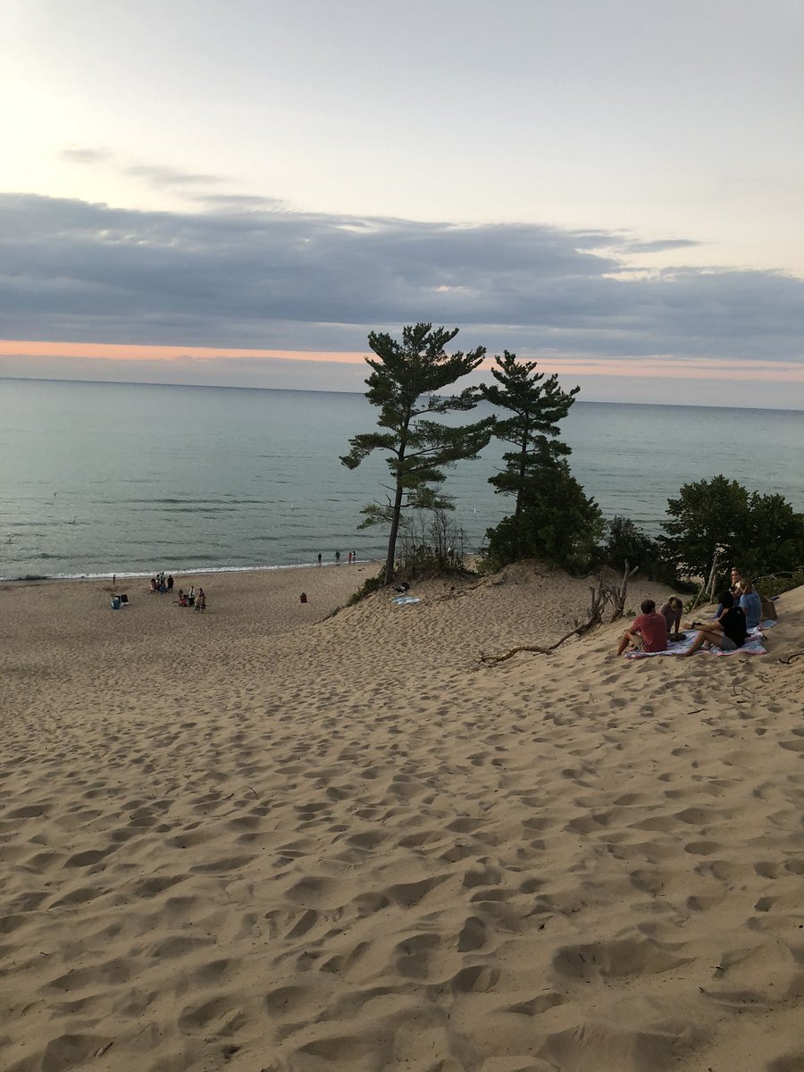 drio_rachel's tweet photo. What a view! Chicago in the distance. The kids wanted to stop and stay here...I donβt blame them. They took a quick dip before the sun set for the day...the water was so comfortable. @IndianaDunesNPS #utahorbust https://t.co/qEVB1FfjMh