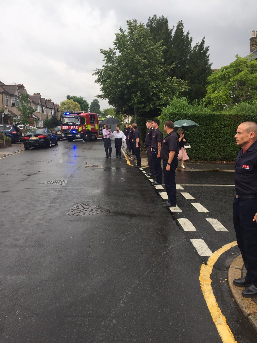LondonFire's tweet photo. A guard of honour for birthday boy Ernie Cock who reached the ripe old age of 100. Ernie joined the National Fire Service in 1946 and then transferred to Brigade. He served the majority of his career at #Poplar fire station. Once a firefighter, always a firefighter. https://t.co/YoVtRnKpTT