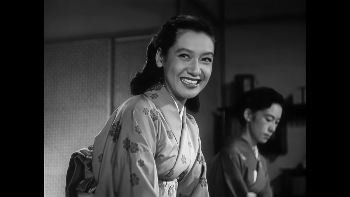 This begins a three-shot back-and-forth conversation sequence. Ozu is “famous” for head-on conversation shots, but in this era especially he spent more time in the usual slightly-off-center pocket.