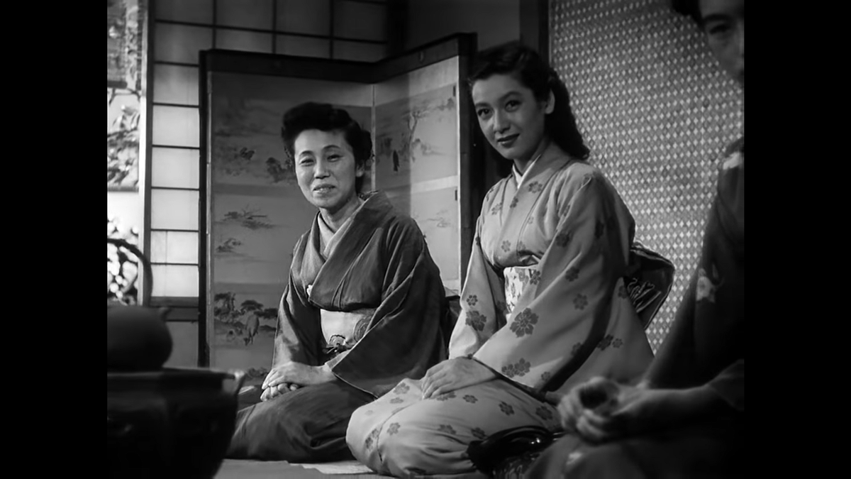 Aunt Masa throws a bit of shade Mrs. Miya’s way about being late. Note Noriko’s melancholic look as she notes Mrs. Miya; one of her greatest mysteries in the movie is a feeling that she always knows more than the audience about where this is headed.