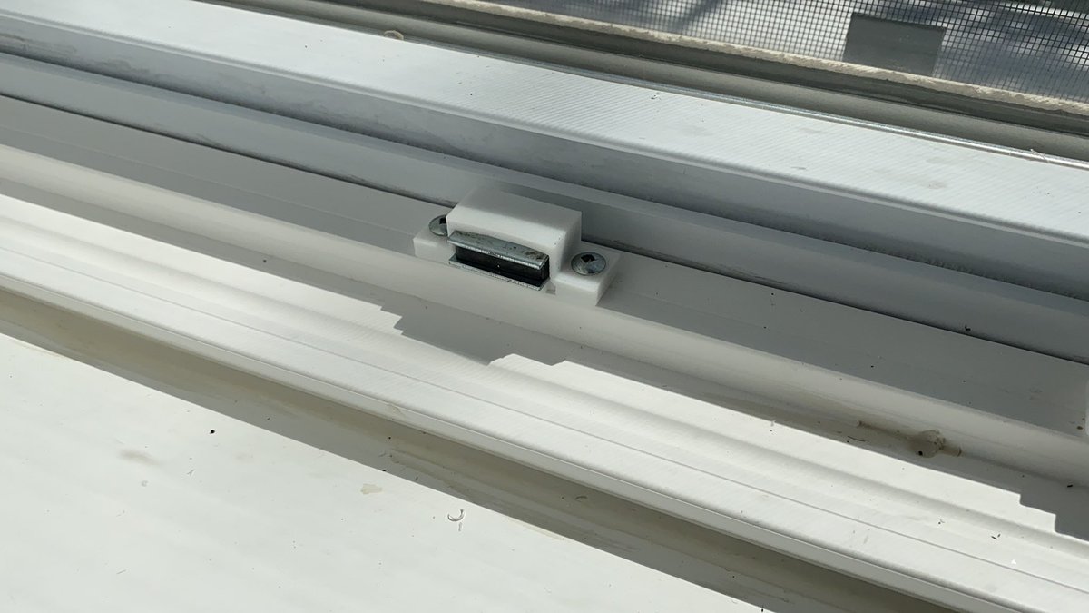 The windows in our house have these tiny little housings that hold magnets to keep them shut