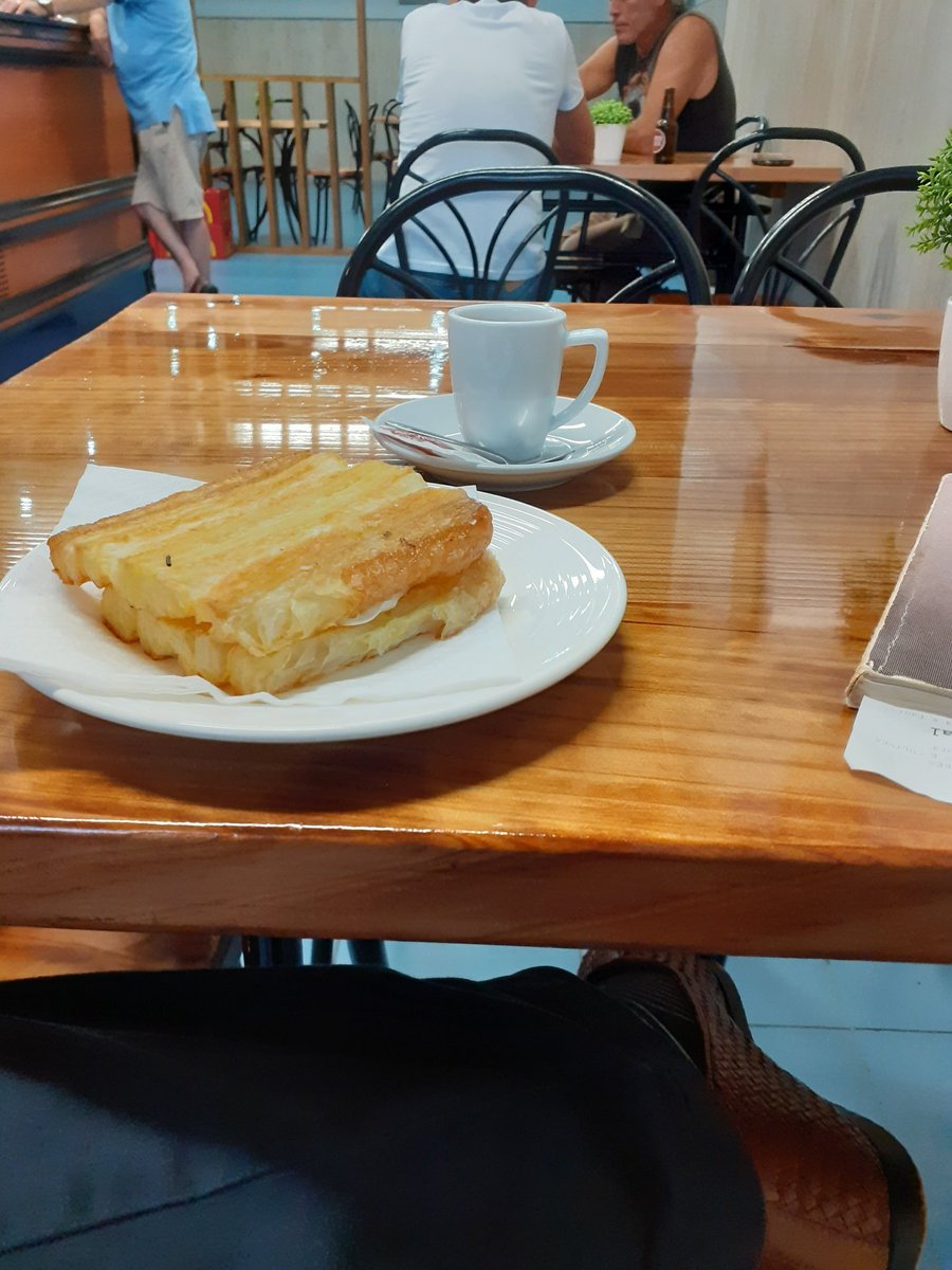 Having a coffee in Povoaçao is not without interest, though. I ended up in one of those bars frequented mostly by men, in this case they look like fishermen.One of them receives a call and starts a convo in almost perfect English about his daddy dying and some heritage...42/n