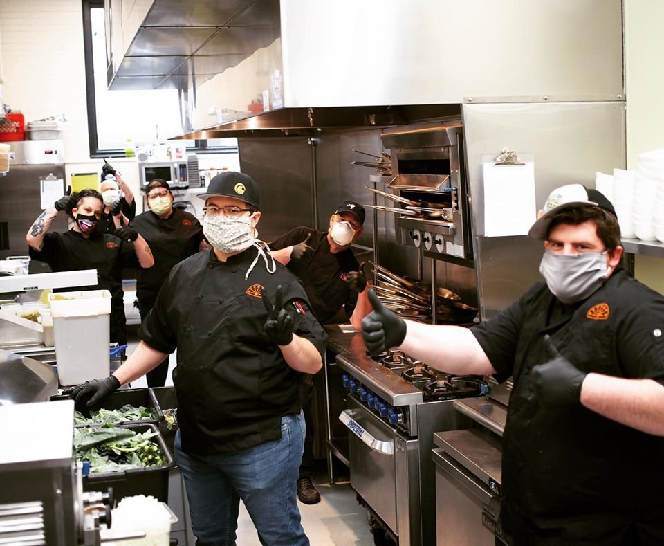 (Its worth noting that while the virus may not spread through surfaces, it can spread when people spend long periods of time in enclosed spaces in close proximity, which is often the case in restaurant kitchens. Decades' kitchen is pictured below.)  https://www.facebook.com/decadeslancaster/photos/thank-you-for-all-your-orders-this-week-its-great-to-have-some-of-the-crew-back-/525815098085310/