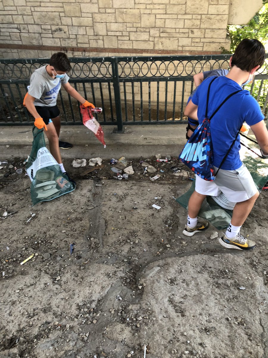 Check out this before and after! A big thank you to <a href="/RockhurstHS/">Rockhurst HS</a> students for helping us pick up #litter today along Brush Creek. Because of their socially distanced service, these bags of trash won't end up in our local waterways. #KansasCity