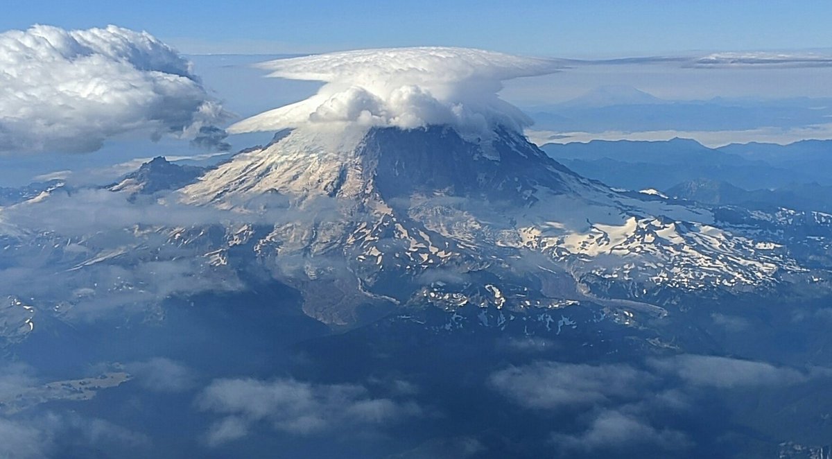Mt. Ranier covered by lenticular clouds this morning.