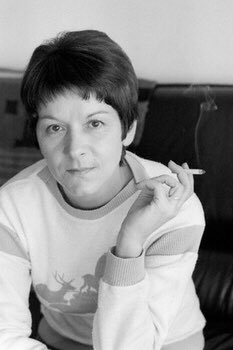Women writers looking bored and holding a cigarette, part 83 in a series: Inès Cagnati