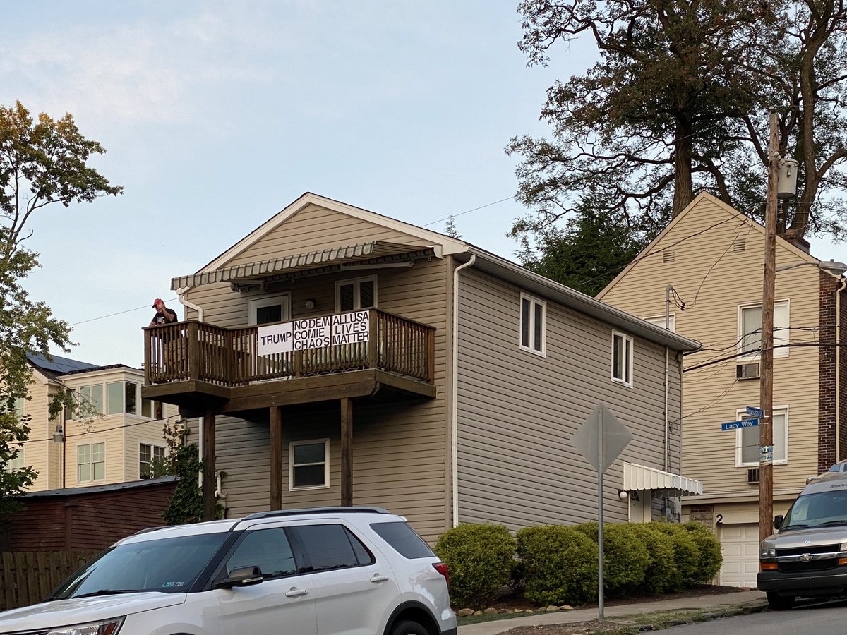 Several doors down from the speeches stands a man in a red hat on a back porch with signs that read “All USA lives matter” and “Trump.” He’s exchanged a few words with bike marshals here blocking off the street.  @905wesa