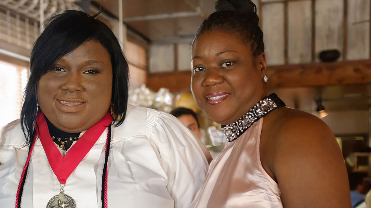 Sybrina Fulton posing with fake witness Rachel Jeantel, whom she knew was an imposter, upon Rachel graduating at age 21 from a special needs HS and after suffering PTSD from the trial. The cruelty of those who knew Rachel was a fake and allowed her testify cannot be overstated.