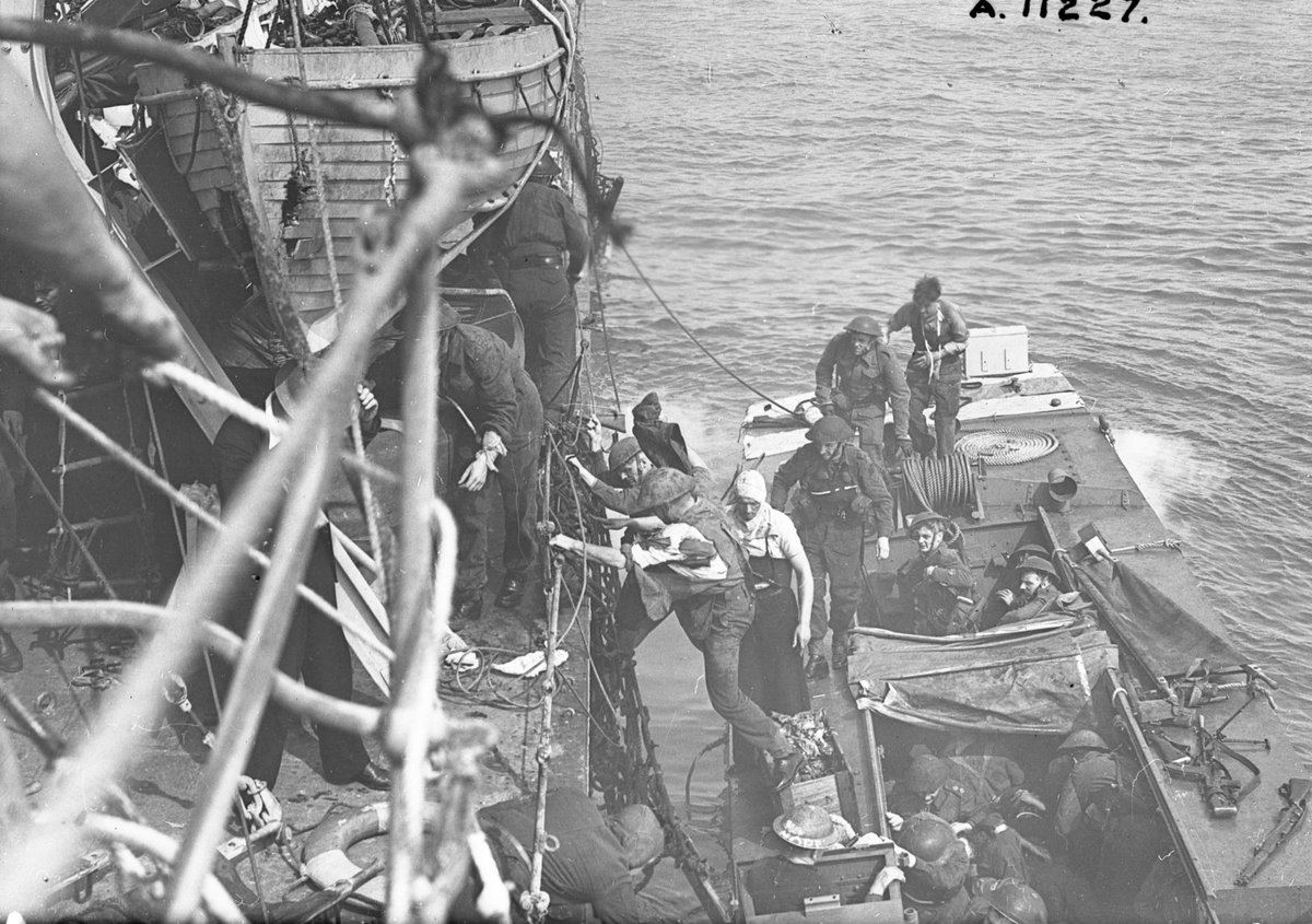 Canadian troops boarding a destroyer following the raid on Dieppe, 19 August 1942. LAC MIKAN: 3396541.