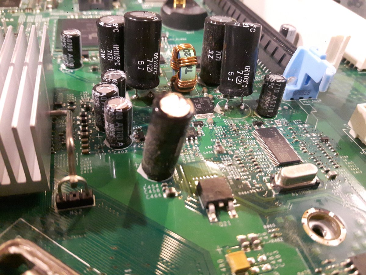 RetroEdgeTech's tweet image. My son and I worked on a #Dell Optiplex 745 with bad capacitors yesterday. Here&apos;s a picture of the bad caps replaced with good ones. My son did the soldering work, I did the advising. Teamwork.

#Tech #Repair #RepairedInTheUSA