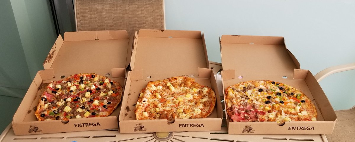 If your food choice isn't available on delivery app, there's always  #entregaemcasaHere's dinner from one of Luanda's many pizza options.Arrived piping hot.