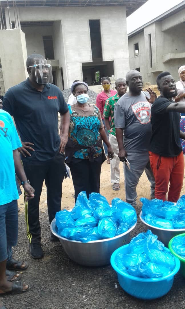 John Dumelo feeds Shiashie residents who were affected by fire outbreak