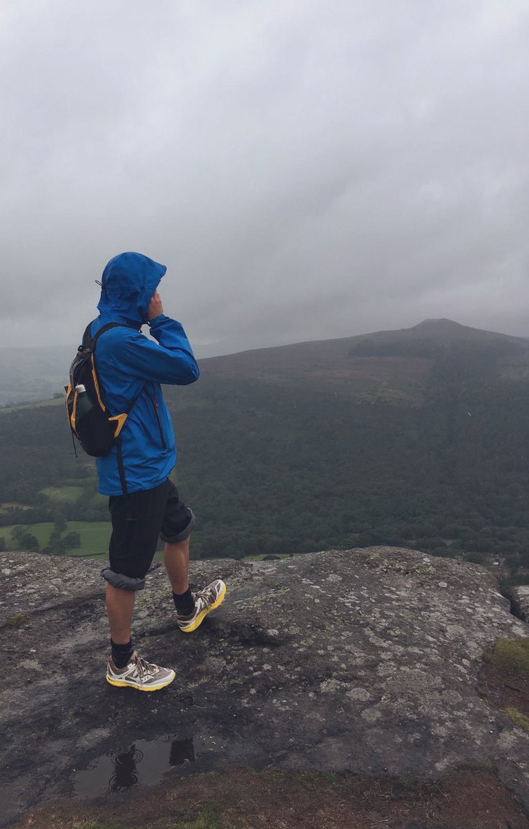 jimwarnersmith's tweet photo. Chatting to @TVNaga01 in the pouring rain about camping in the pouring rain (while wearing some strange pouring rain clothing) this lunchtime. On top of Bamford Edge in the Peak District. The perfect setting for a rainy broadcast! https://t.co/9W6jv3unJ4