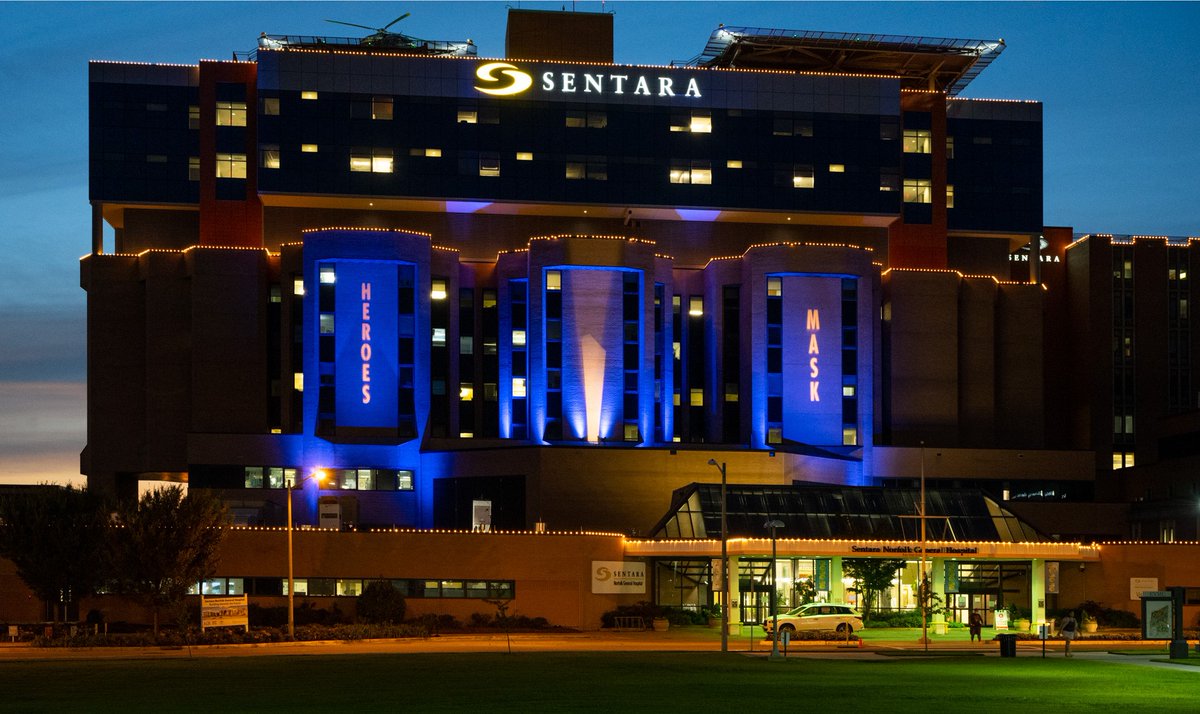 sentarahealth's tweet photo. Be a hero - wear your mask! Join our healthcare heroes in the fight against #COVID19 by wearing a mask when out in public/within 6 feet of another person. Lights at Sentara Norfolk General Hospital are a reminder to our community that #HeroesWearMasks. #SentaraHeroes #WhyWeMask https://t.co/1S0TnpAS7J