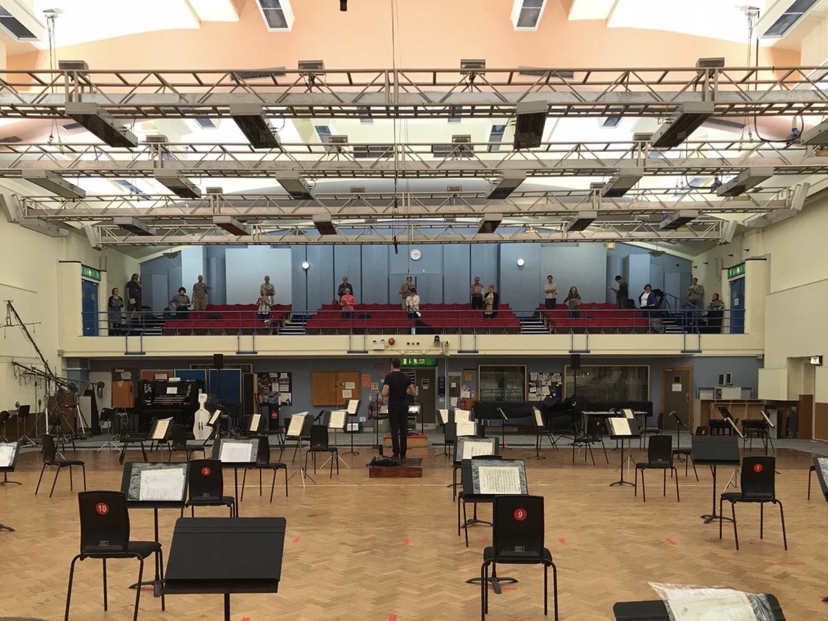 BBCSingers's tweet photo. It’s wonderful to be back at Maida Vale, even if it’s not quite as we know it! We are appropriately distanced in the balcony while the floor is set for @BBCSO who start rehearsing for @bbcproms later this week. https://t.co/qPRb2njYXa
