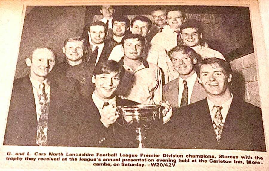 .... and holding the cup.