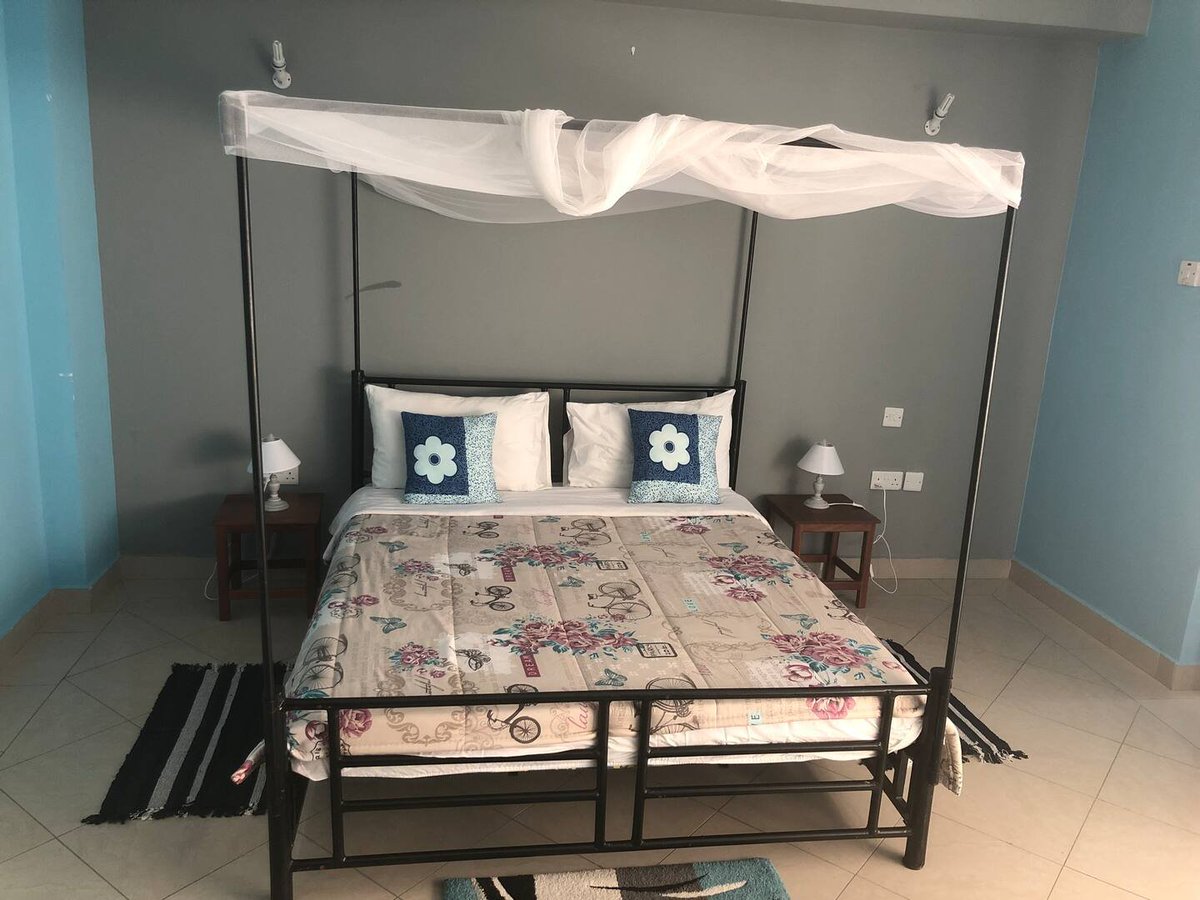 This Airbnb hosted by Nancy will only cost you TZS 58,000 a night, here you can watch Netflix, Free Internet, Swimming (Beach &amp; Pool), A whole King bed and guest room. Located in Mikocheni, Dar es salaam | #TzHotels #Travel Subscribe: bit.ly/TanzaniaHotels