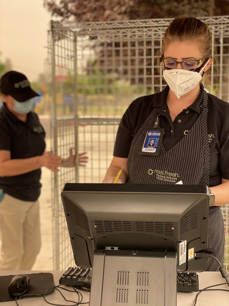 TurlockUSD's tweet photo. Can we get a shout out for our Child Nutrition staff distributing meals under an apocalyptic sky to ensure no TUSD student goes hungry? Thank you, heroes! 🦸‍♀️🦸‍♂️🍊 #TUSD #REALFRESH https://t.co/9QMOe4t8Xf