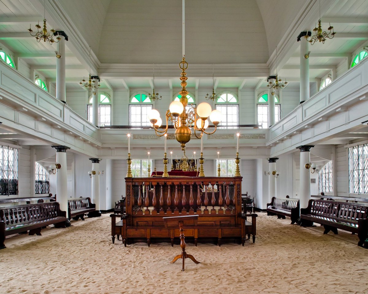 Neveh Shalom Synagogue was built by Dutch Sephardi Jews in 1723 in Paramaribo, Suriname. (They had a thing for sandy floors)They sold it to Ashkenazi Jews in 1735 and it is still the only Ashkenazi synagogue in Suriname.The Keizerstraat Mosque is next door 