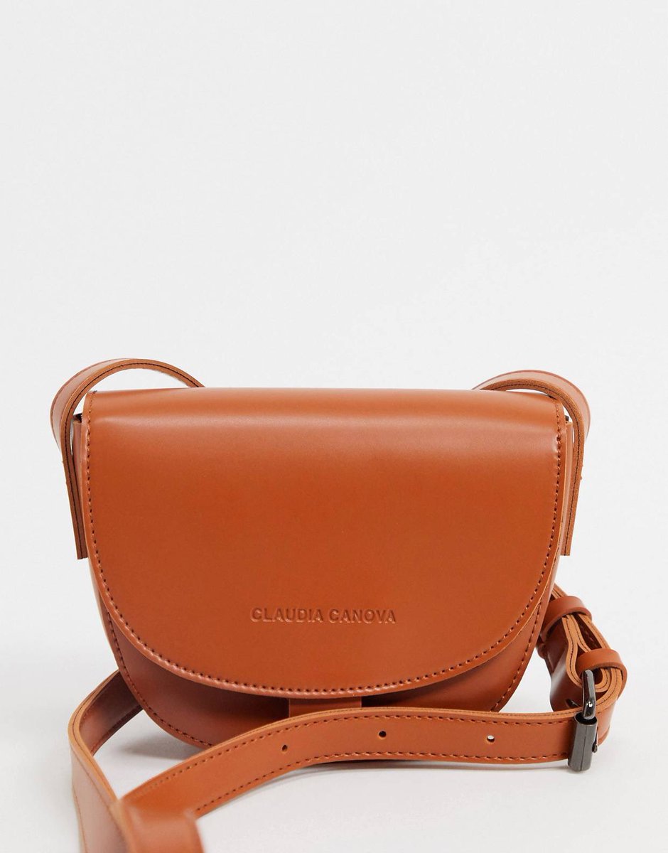 Half Moon Cross Body BagThis beauty can be paired with jeans and a pretty top or even a dress Available to order in Tan and Powder Blue Price-16,500