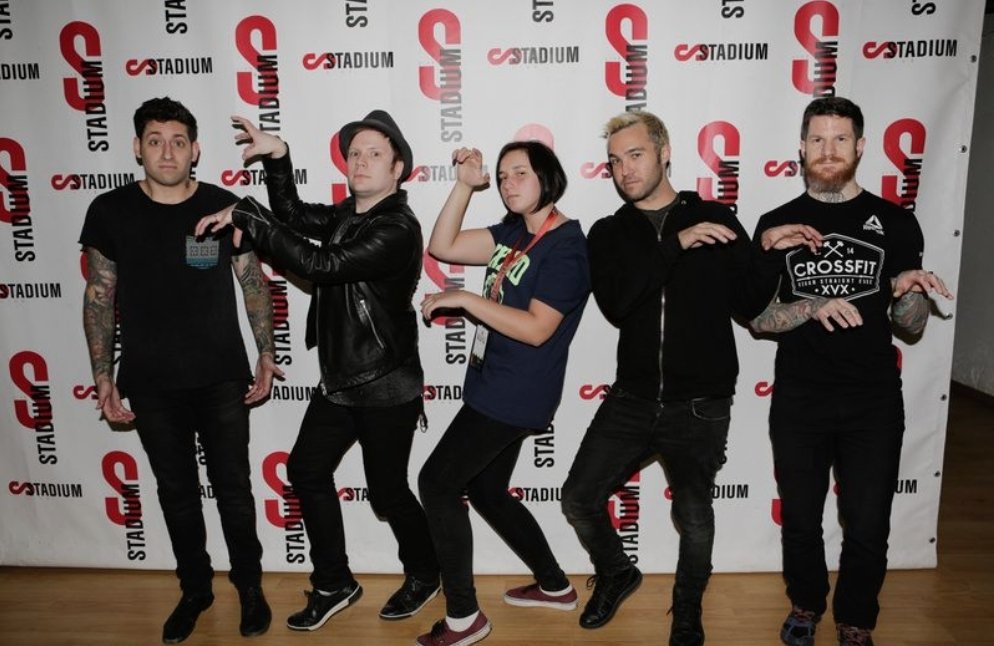 in honour of joe trohman& #39;s birthday, here is a thread of him not doing what the other fall out boys™ are doing in photos ✧･ﾟ: *✧･ﾟ:*