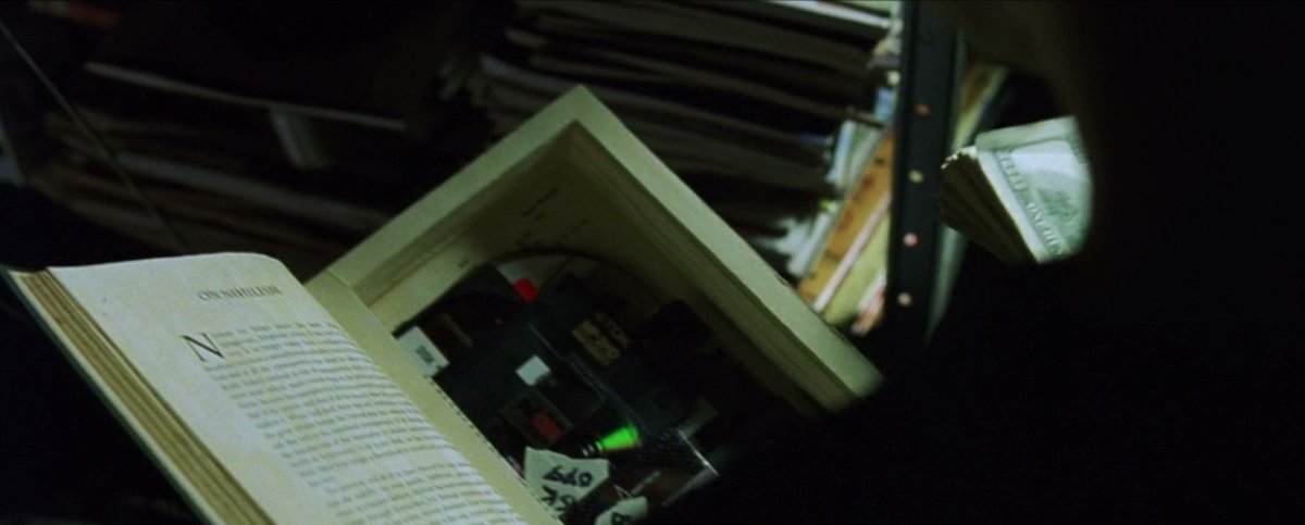 25/Which is why Baudrillard& #39;s book "Simulacrum and Simuation" makes an appearance in the movie in the opening scene when Neo has to get a hidden disk for someone: