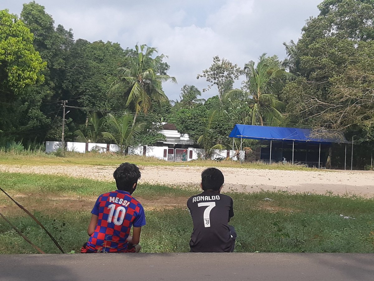 Found them flying a lone kite in the otherwise teeming temple ground. When the pandemic robs you of all Onam fun, all rivalries just disappear, I guess. 
#Onam2020 #COVID19