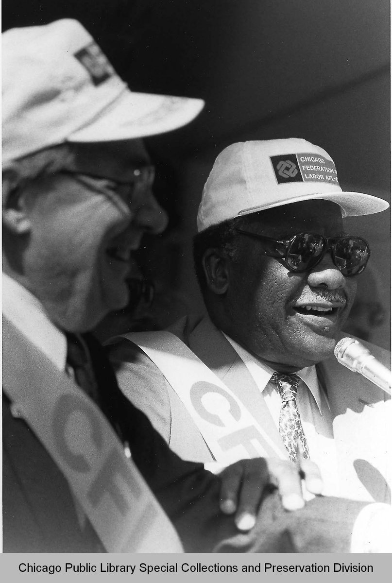 Mayor Harold Washington pictured with Lane Kirkland, President of the AFL-CIO, during the Labor Day Parade September 1, 1986. During Washington's speech, he said that 'a strong Chicago requires a vigorous labor movement. A strong labor movement requires a vigorous Chicago.'