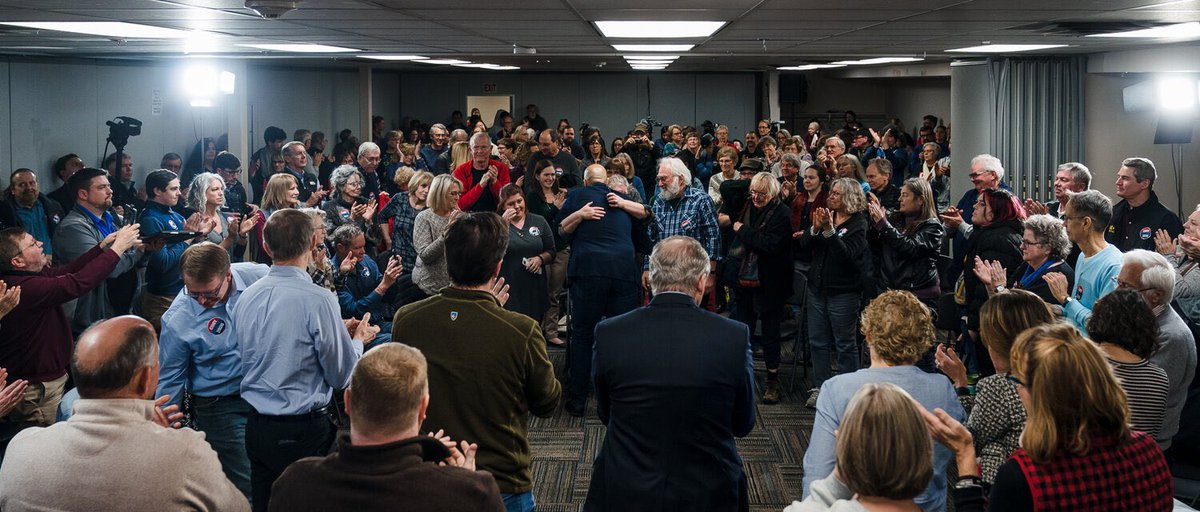 Immediately falling into the crowd to hug after an event in Iowa.