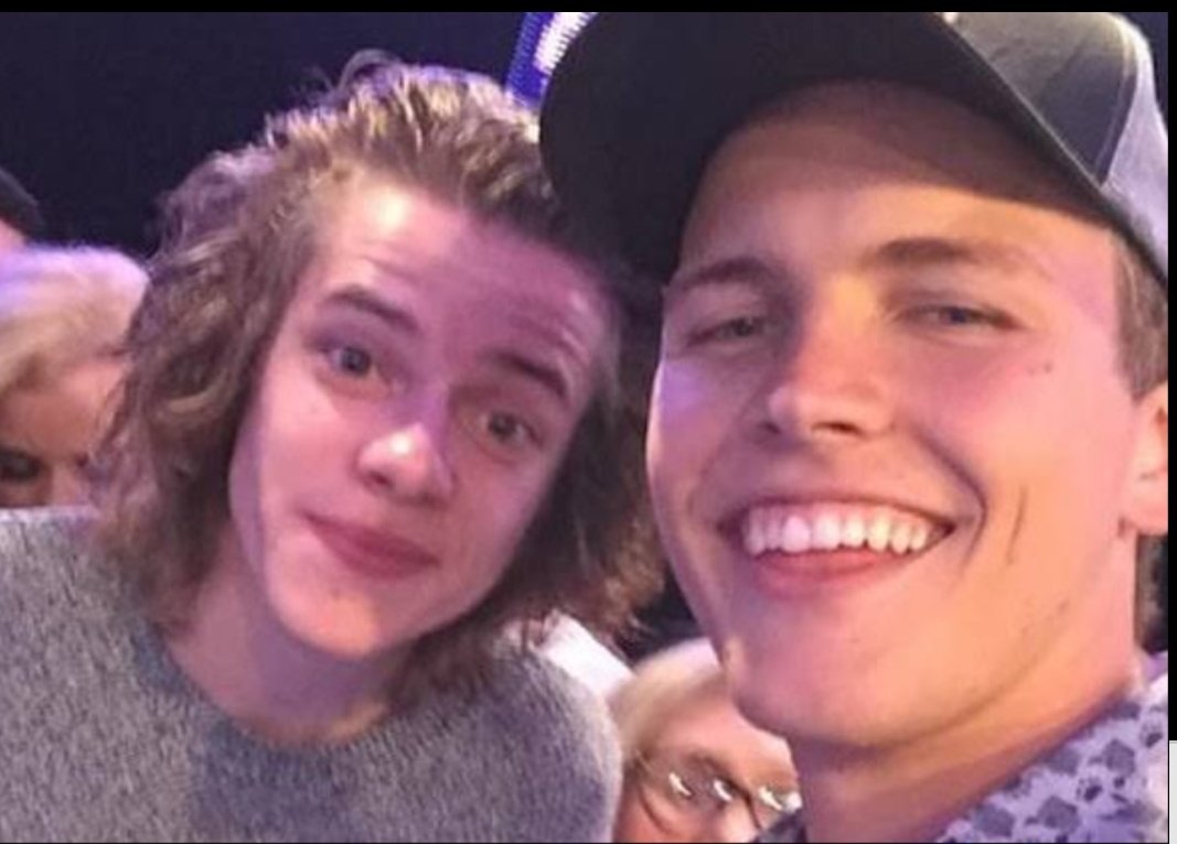 harry unseen with a fan after a concert