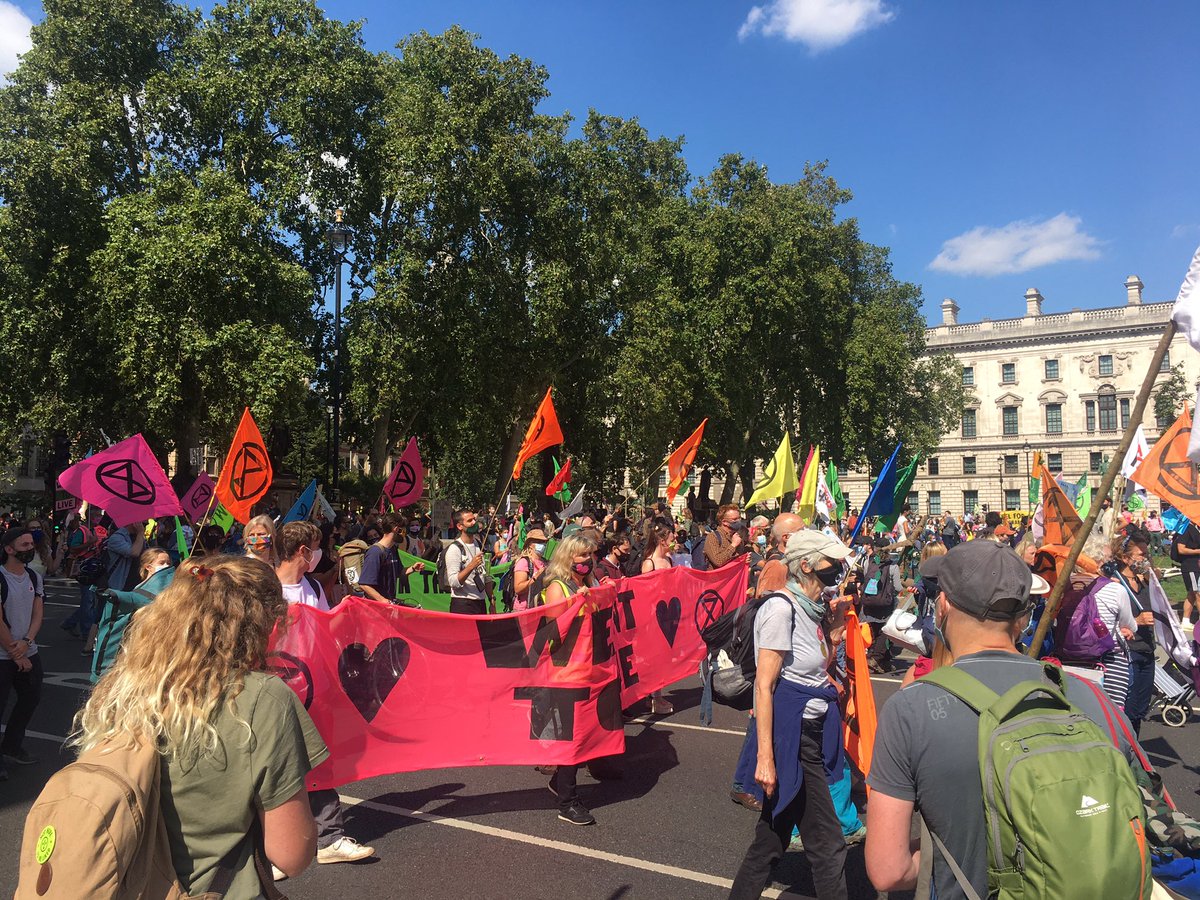 XR_Watford's tweet photo. We teamed up with @XR_StAlbans today for an inspiring start to the #rebellion at Parliament Square. Good to see so many rebels out #WeWantToLive https://t.co/N5TBiOJp1A