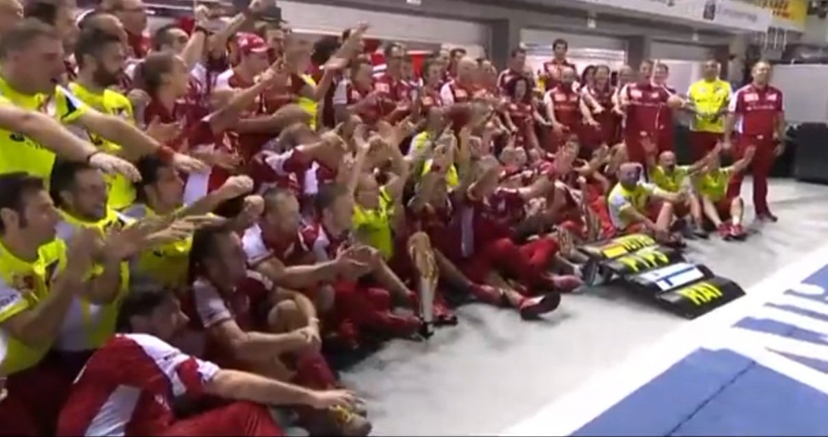 Singapore 2015. After Sebastian Vettel's victory the team got together to take the traditional photo in the pits. However Seb looked at the pitboard and did not see Kimi Raikkonen's name there who finished P3. He pointed it out, the change was made and the photo was taken.