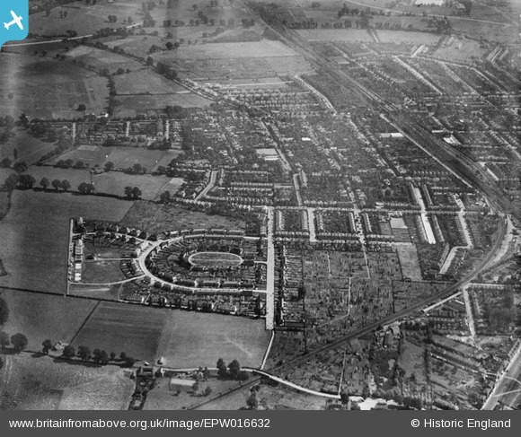 The Britain from Above site has an aerial photograph taken in 1926 - not long after the site was developed. You can see the suburbs slowly swallowing up farmland. https://www.britainfromabove.org.uk/en/image/EPW016632