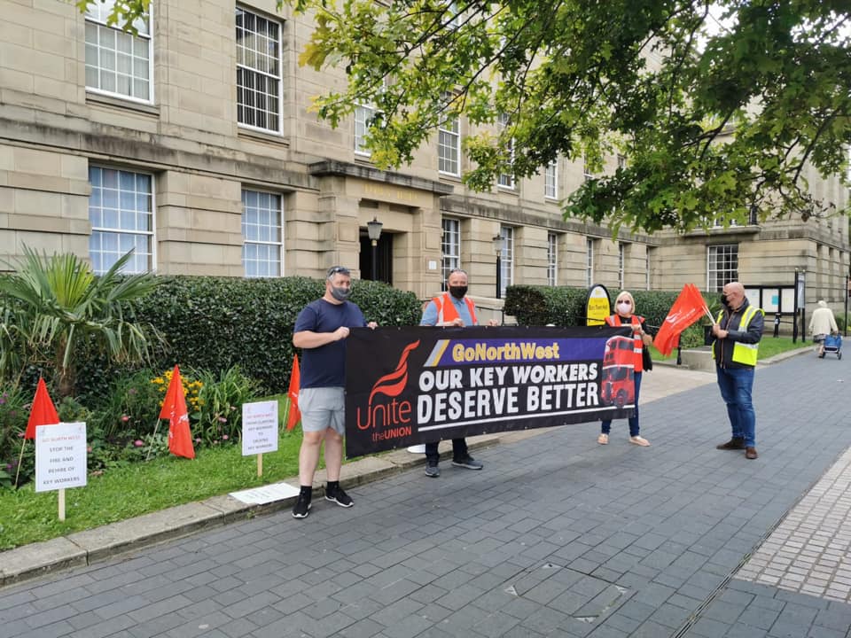 GoAttacks's tweet photo. Our @unitetheunion brothers &amp; sisters outside Bury Town Hall @BuryCouncil today. Oi! @GAGNigel, @gnwbus &amp; @TheGoAheadGroup Bus Drivers - Key Workers deserve BETTER! You are DISGRACEFUL! @DavidCu90707460 @OfficialTfGM @AndyBurnhamGM @TfL @SadiqKhan @BetterBusesGM @SalfordTUC https://t.co/kv67BkZMAs