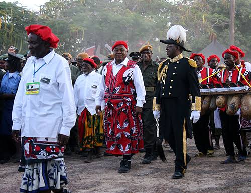 t20/ Males wear a siziba- a red, black & white skirt-, red beret (lishushu) and a waistcoat.  Rupiah Banda looking resplendent.