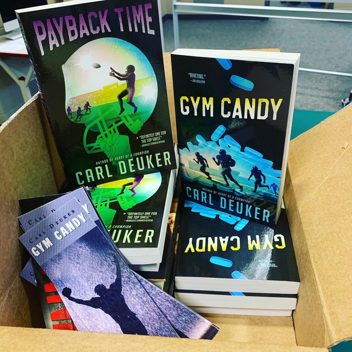 First day back and I got to surprise some students from our Golden Arm summer school book club with a special home delivery. Thanks <a href="/carldeuker/">Carl Deuker</a> for sending us the awesome box of books and autographed bookmarks!  @chendricks512 <a href="/deperems/">DePere Middle School</a> #firstdayofschool #middleschoollibrary