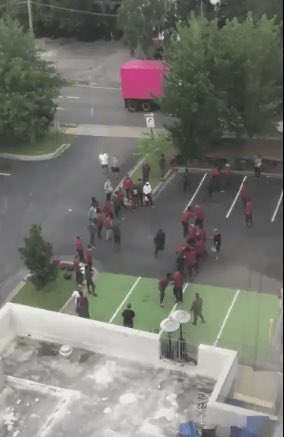 Going over plays in the HOTEL PARKING LOT - where opposing fans literally recorded what they were doing - before his 1st game vs VT (I drove by this on my way to the game)