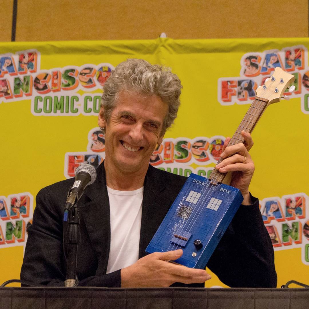 brinatello's tweet photo. #WaybackWednesday (September 2, 2017): #PeterCapaldi attends @SF_ComicCon to greet fans and receive wonderful gifts such as a TARDIS-shaped ukulele at his Q&amp;A panel. Photos by Justin Lai. #DoctorWho #TwelfthDoctor #SFCC2017 #SFComicCon2017 #WednesdayVibes https://t.co/4AqwbJyEtD https://t.co/7o9gQBqdSo