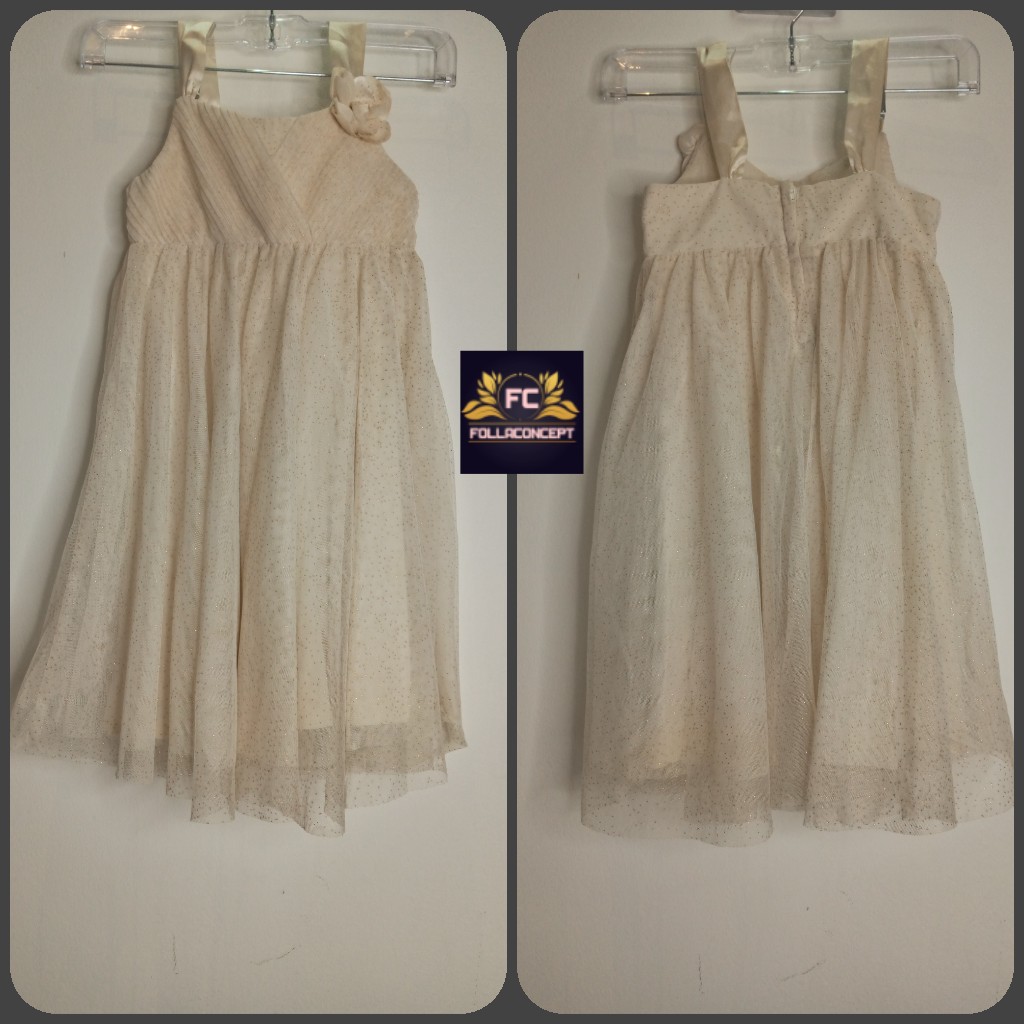 Champagne gold ball gown Age: 4-5 yearsPrice: #2,000
