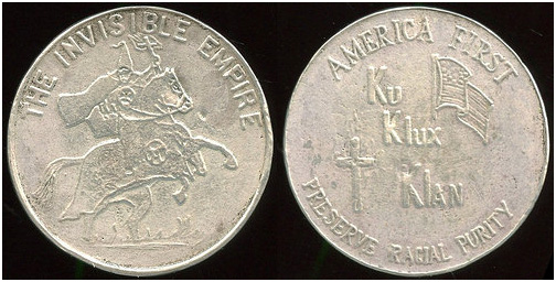 . @realDonaldTrump is so incredibly racist that he uses a KKK campaign slogna. FACT. This is a KKK token and that on the back in all caps is Trump's campaign slogan.