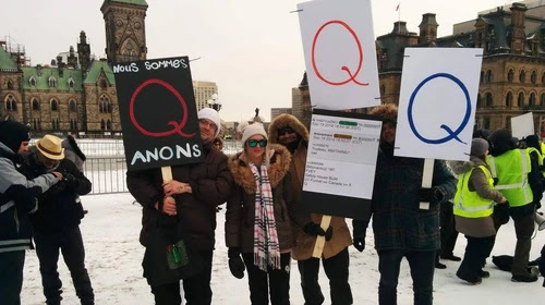 QAnon is an American based conspiracy theory which has spread through out the world, including Canada. Q signage has been seen at many far-right rallies. /2