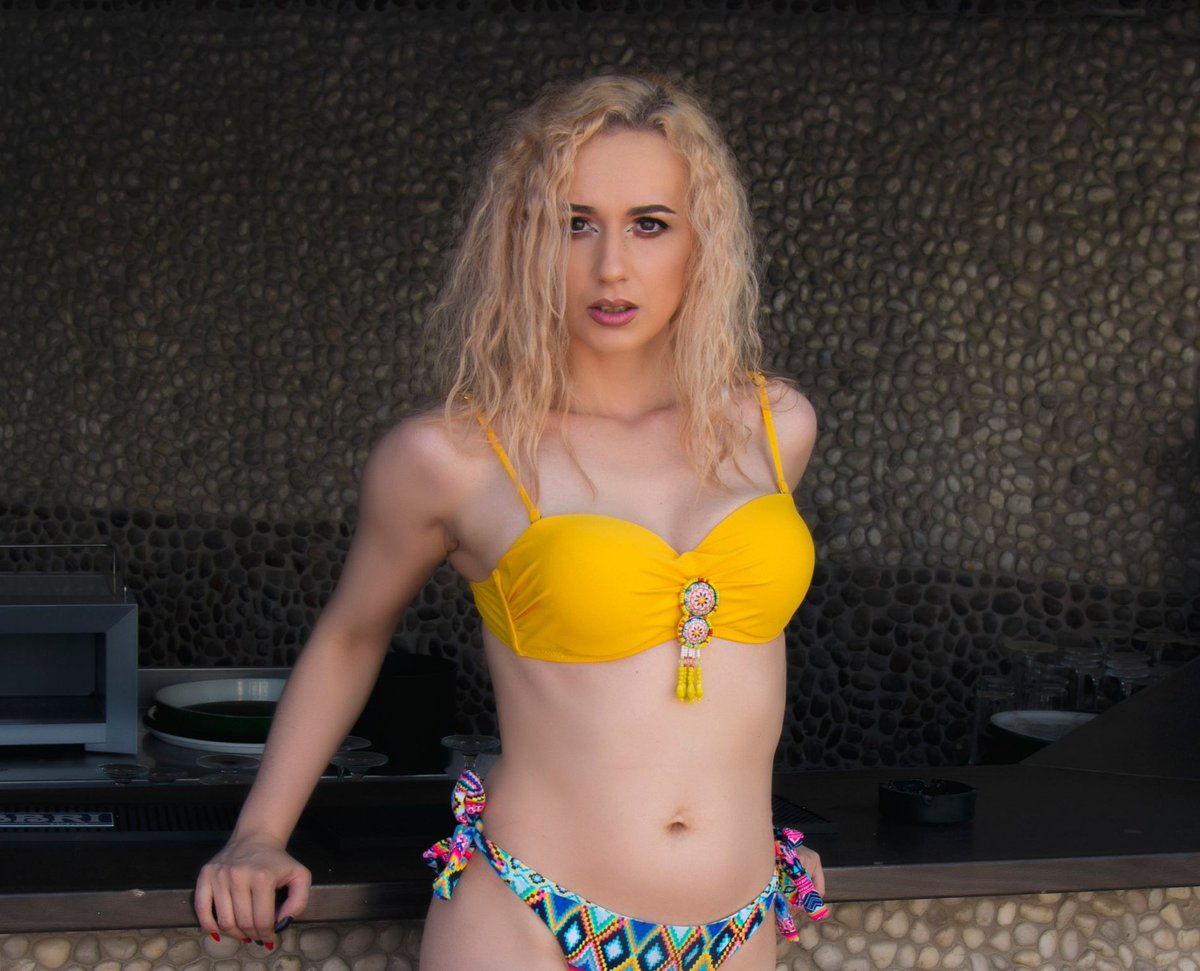 Looking at YouTube #summerwear #yellowswimsuit #blondehair